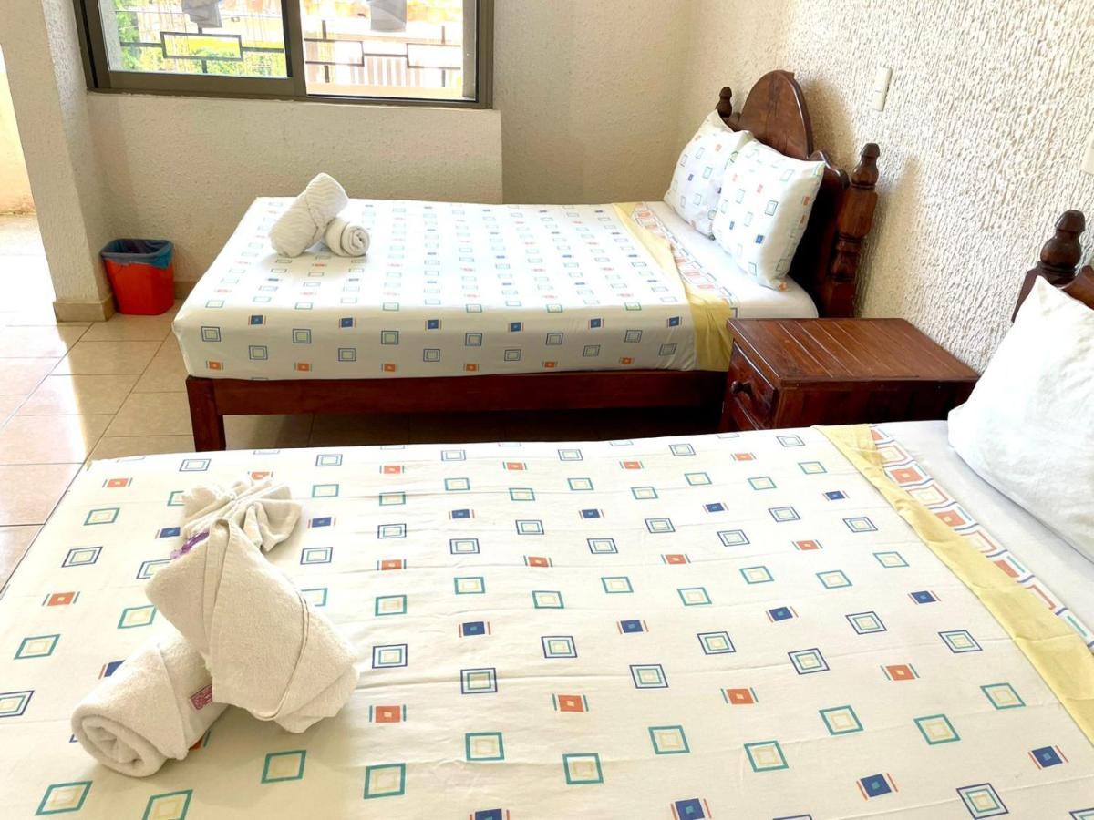 Hotel Bigu ปูแอร์โตเอสกอนดิโด ภายนอก รูปภาพ