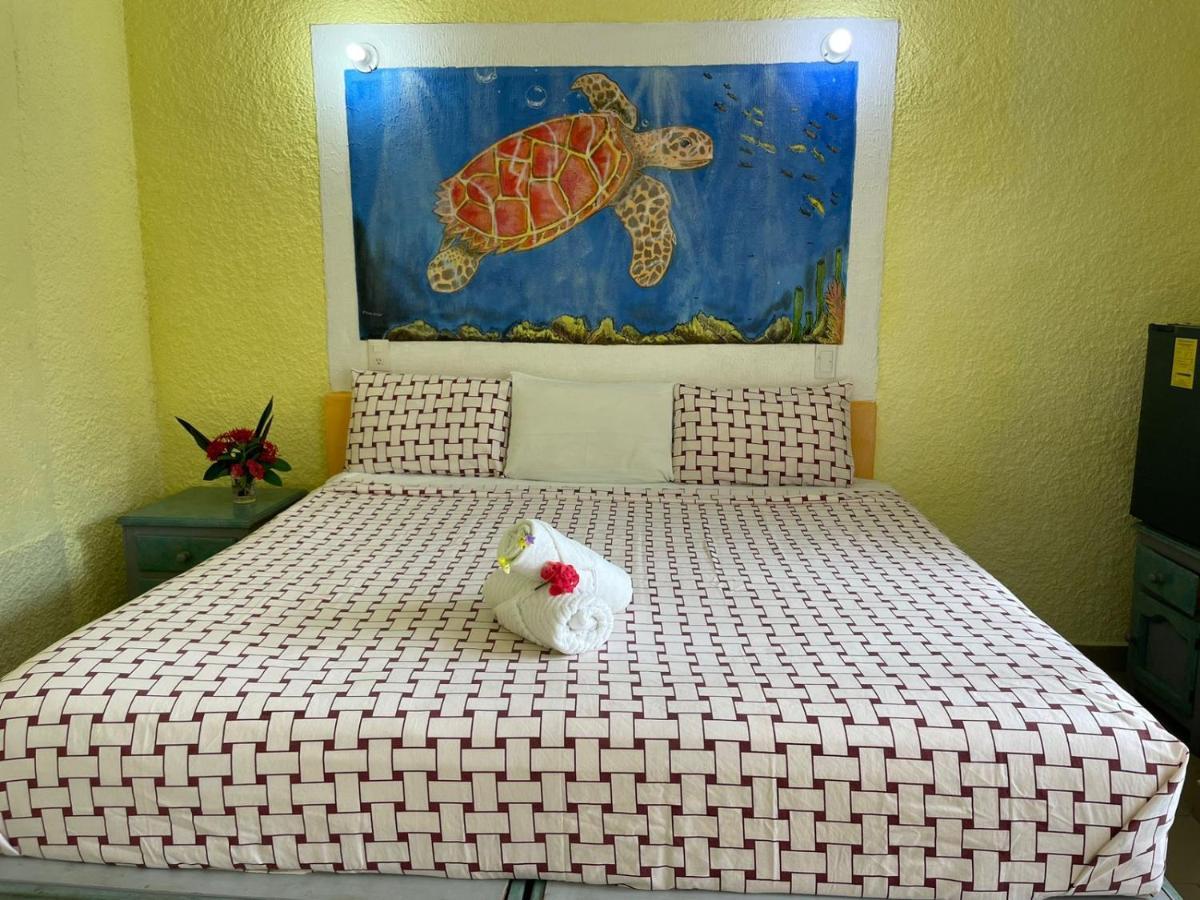 Hotel Bigu ปูแอร์โตเอสกอนดิโด ภายนอก รูปภาพ