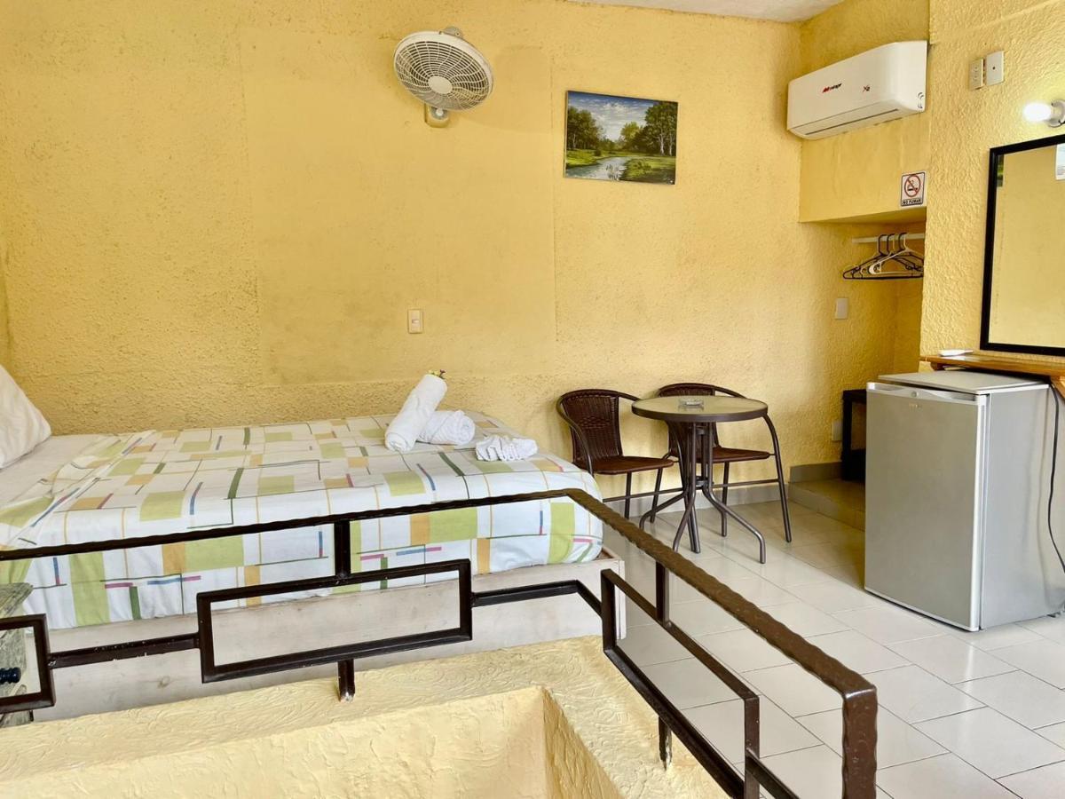 Hotel Bigu ปูแอร์โตเอสกอนดิโด ภายนอก รูปภาพ
