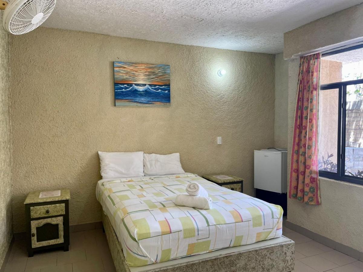 Hotel Bigu ปูแอร์โตเอสกอนดิโด ภายนอก รูปภาพ